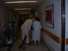 Eric helping me walk and pulling my oxygen tank.